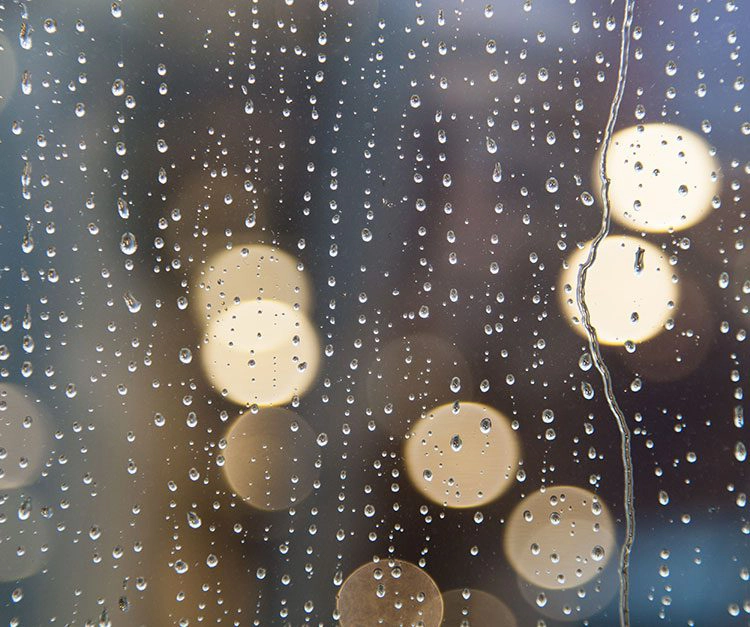 rain covered window glass
